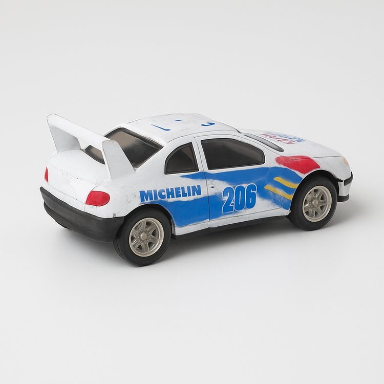 Die-Cast White Racing Car – Shell & Michelin 206 Rally Edition