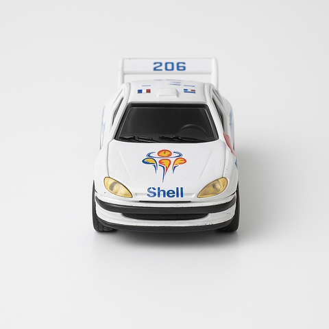 Die-Cast White Racing Car – Shell & Michelin 206 Rally Edition