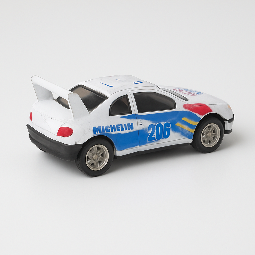 Die-Cast White Racing Car – Shell & Michelin 206 Rally Edition