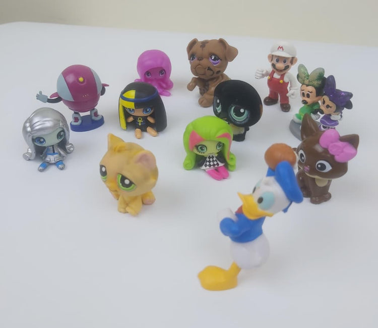 Bundle of 12 Collectible Mini Toys β Mixed Characters, Slightly Used
